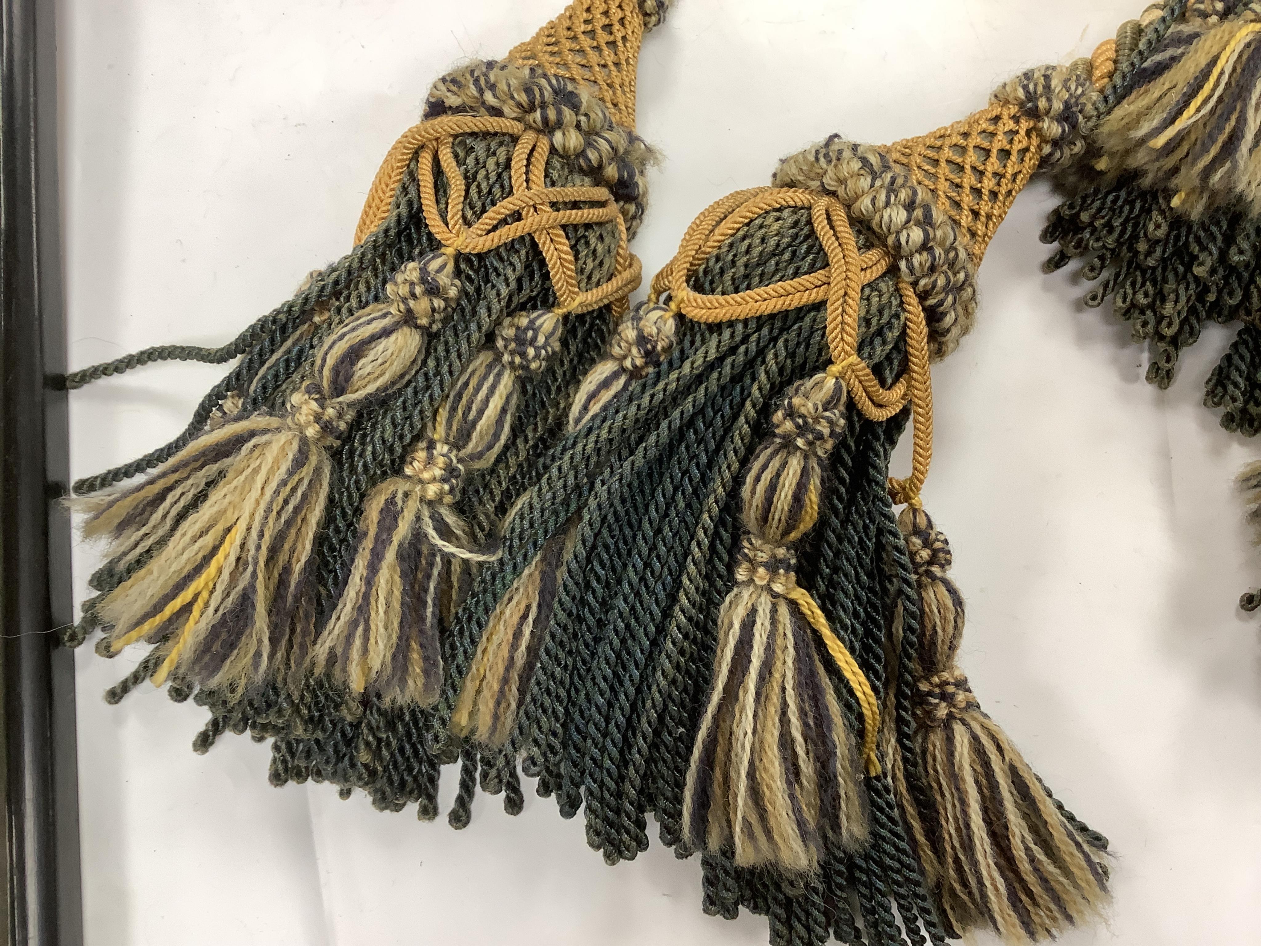 Two 20th century long corded, double tasselled silk and wool tie backs, 194cm each. Condition - some fading.